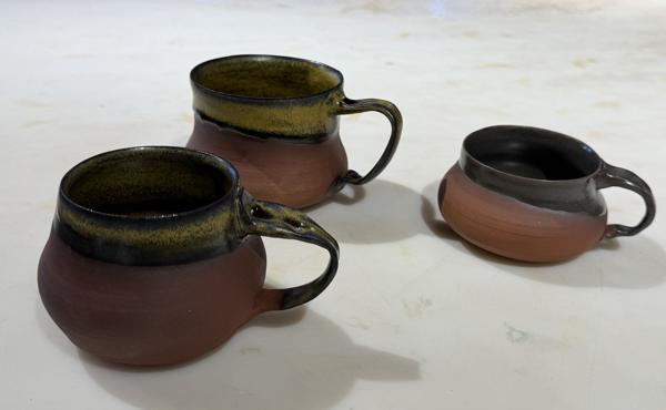3 mugs with raw, smooth, red stone body